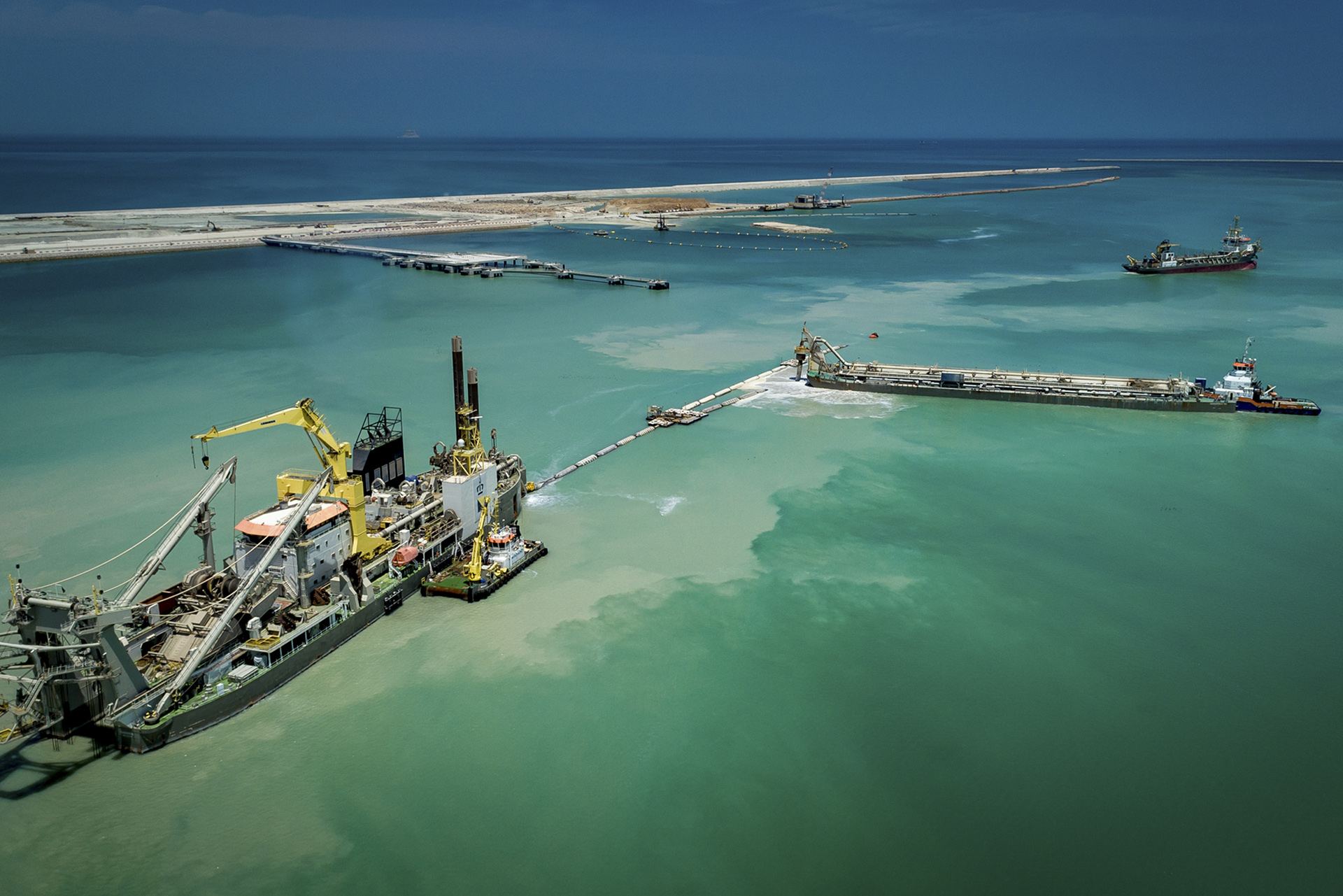 Removal of the sand bunds following the controlled flooding of the polder